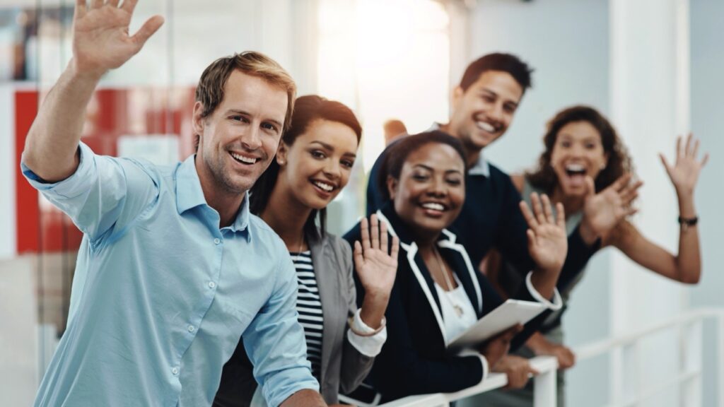 Excited Team Waving