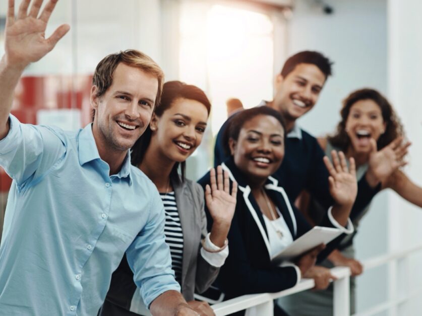 Excited Team Waving